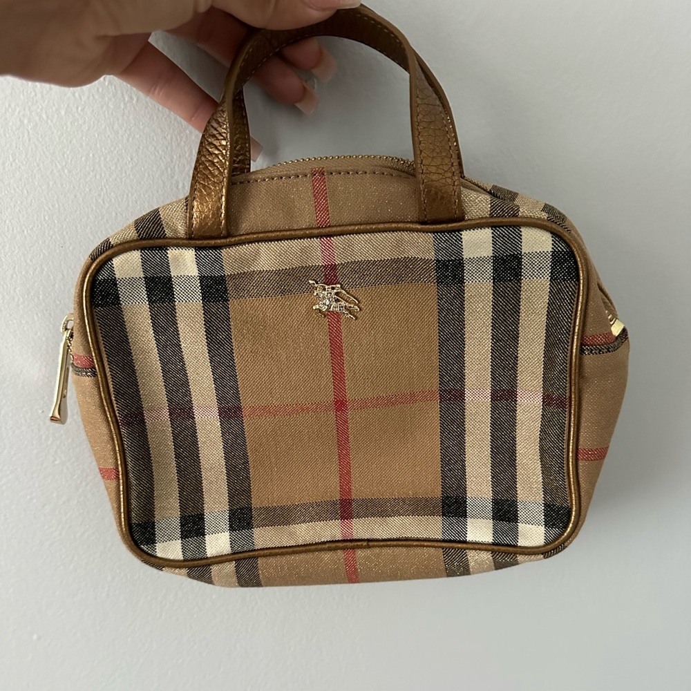 BURBERRY
Glitter House Check Mini Handbag